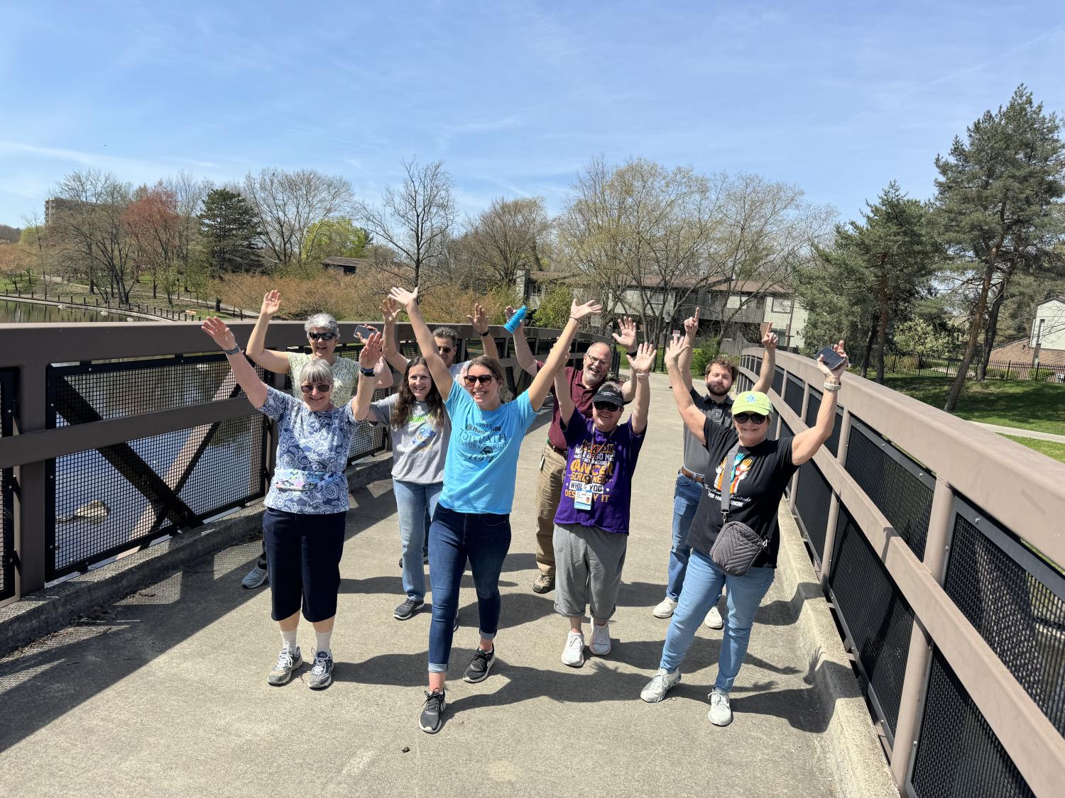 Healthy Steps participants with hands in the air